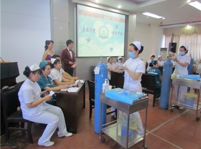 我院举行庆祝5.12国际护士节、技术比武、歌曲大赛及表彰大会